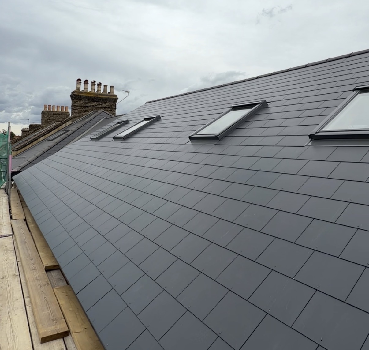 Structural works — the new slate roof and rooflights completed